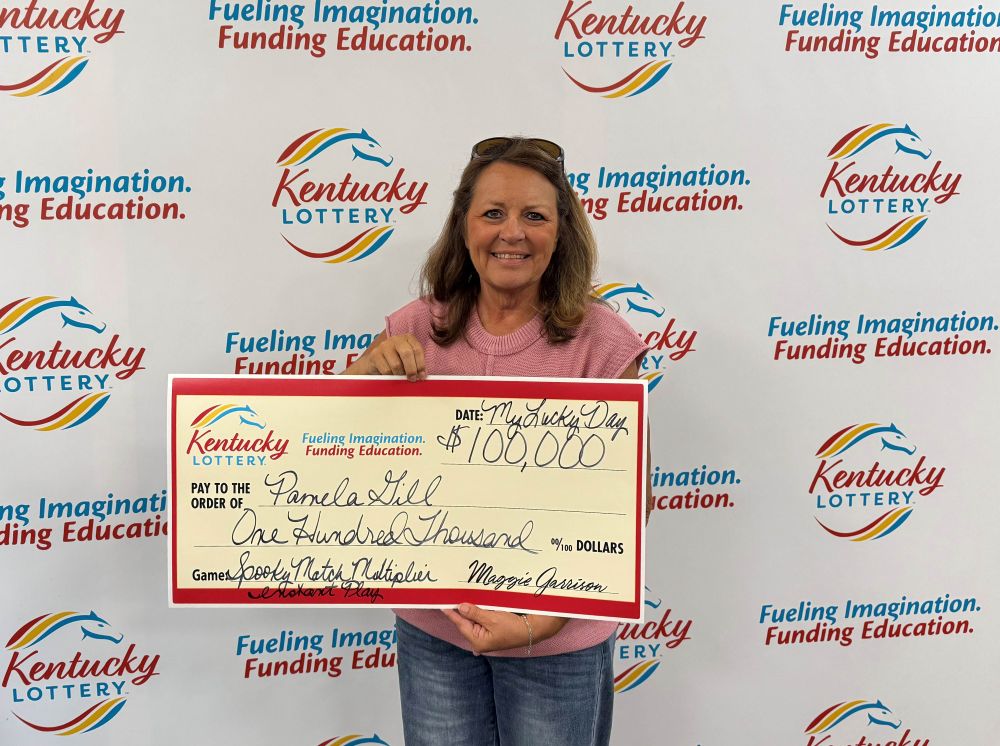 Image depicts the amount won on a specific lottery game. Winners may be in the image holding a large check made out to the amount they won. Clicking this image will open a new tab with that shows the story behind the win.
