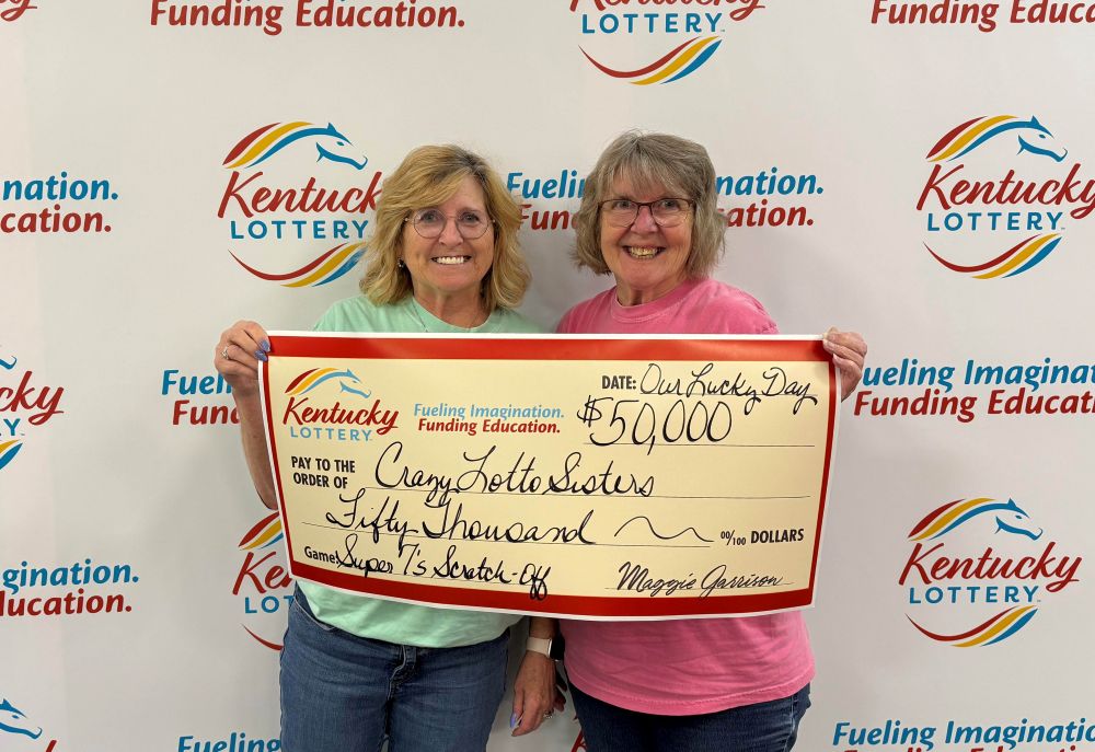 Image depicts the amount won on a specific lottery game. Winners may be in the image holding a large check made out to the amount they won. Clicking this image will open a new tab with that shows the story behind the win.