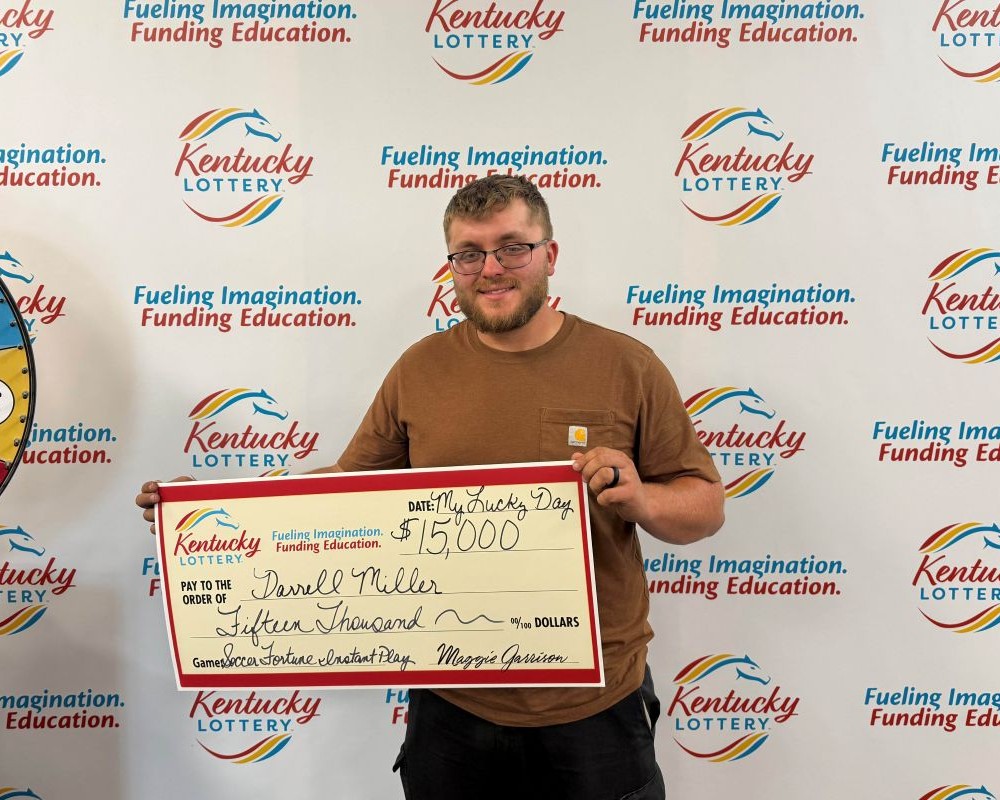 Image depicts the amount won on a specific lottery game. Winners may be in the image holding a large check made out to the amount they won. Clicking this image will open a new tab with that shows the story behind the win.