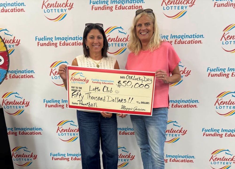 Image depicts the amount won on a specific lottery game. Winners may be in the image holding a large check made out to the amount they won. Clicking this image will open a new tab with that shows the story behind the win.